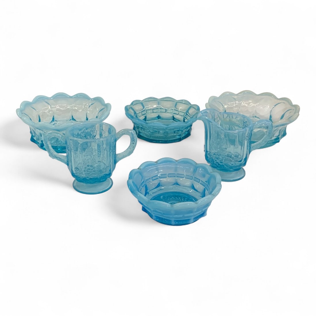 Blue Opalescent Paneled Grape Glassware: 3.5" Creamer & Matching Sugar.Two 5.75" Diameter Bowls. 5" Diameter Bowl.4.5" Diameter Bowl.