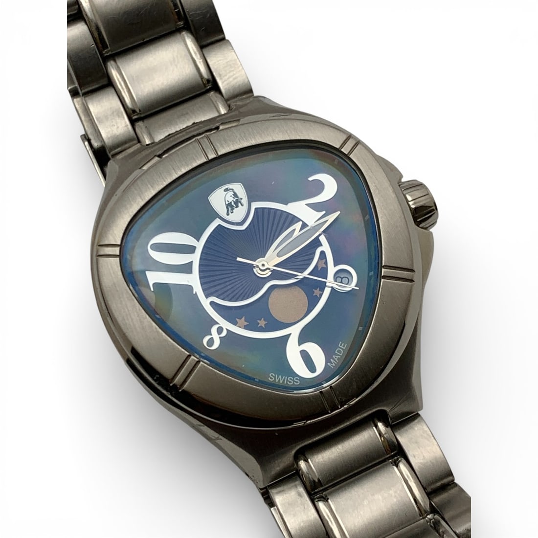 Men's Conino Lamborghini Wrist Watch: Marked On Face: Swiss Made Marked On Back: Conino Lamborghini, Stainless Steel, Sapphire Coated Crystal, Swiss MadeMarked On Band: Conino Lamborghini1 1/2" Face Diameter