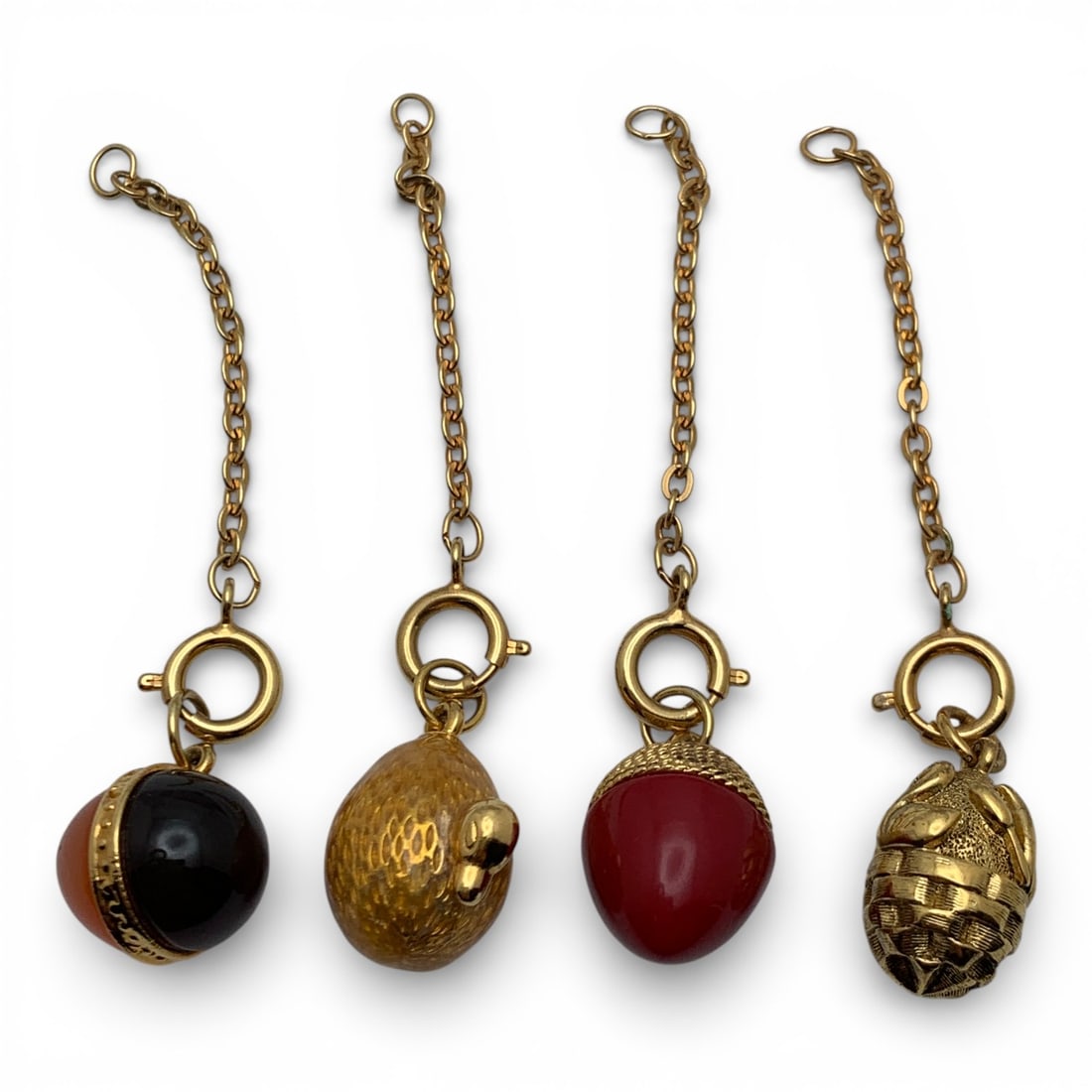 Group Of 4 Enameled Egg Charms: 7/8" Long - See Photos