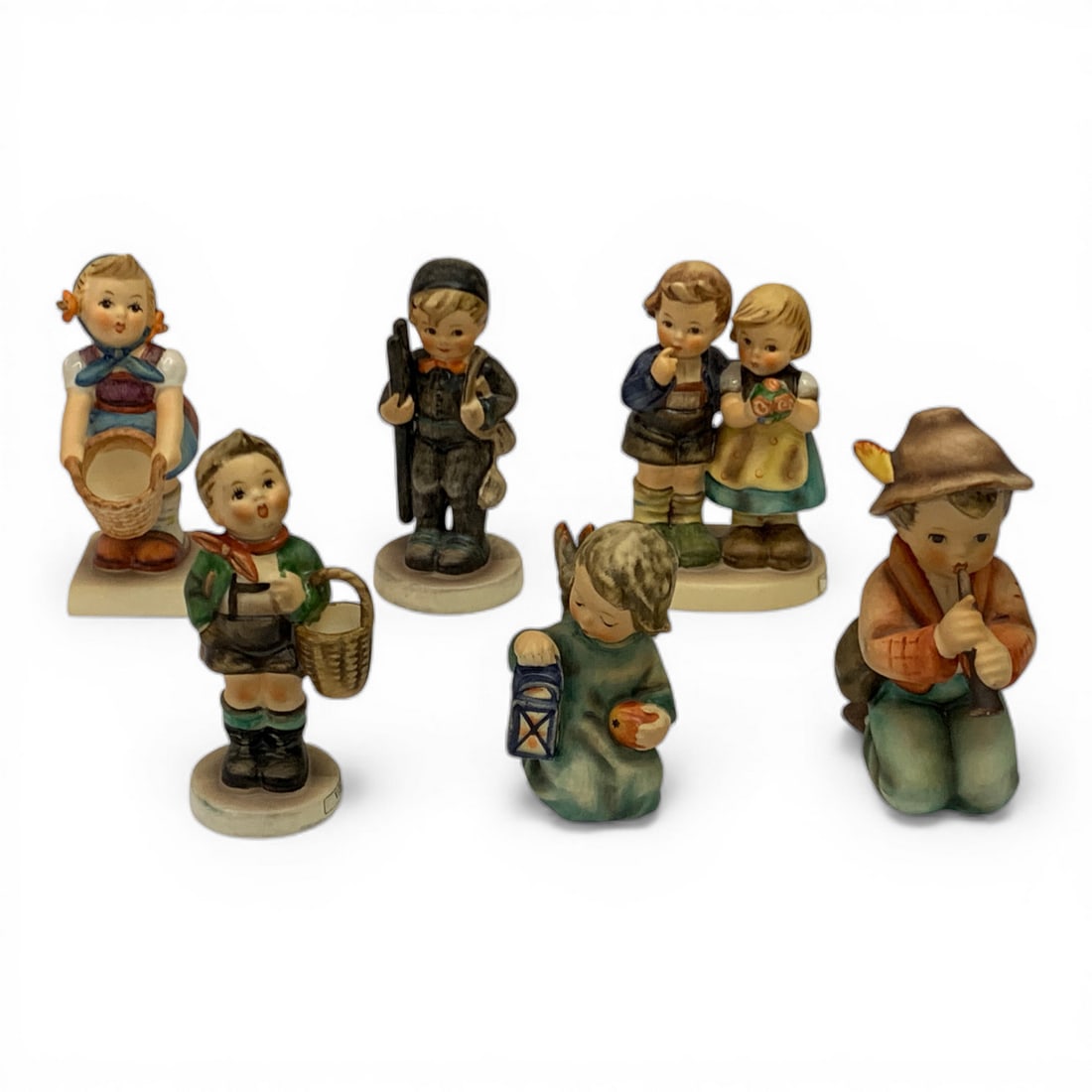 Collection Of 6 Hummel Figurines: Little Tooter, We Congratulate, Village Boy & Happy PastimeApprox 4" Tall