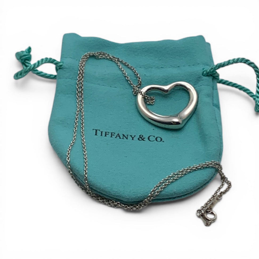 Tiffany & Co Sterling Heart Pendant Necklace: Marked: Tiffany & Co, 925 - 19" Long - 10.4 Grams Includes Tiffany & Co Cloth Drawstring Bag
