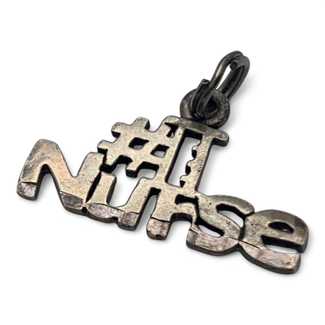 Sterling Silver Charm: Marked 925 - 5/8" Long - 1.3 Grams