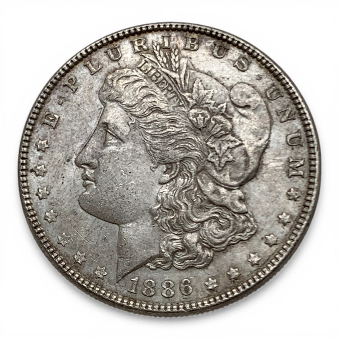 1886 Morgan Silver Dollar: 90% Silver Content - United States Of America~ One Dollar