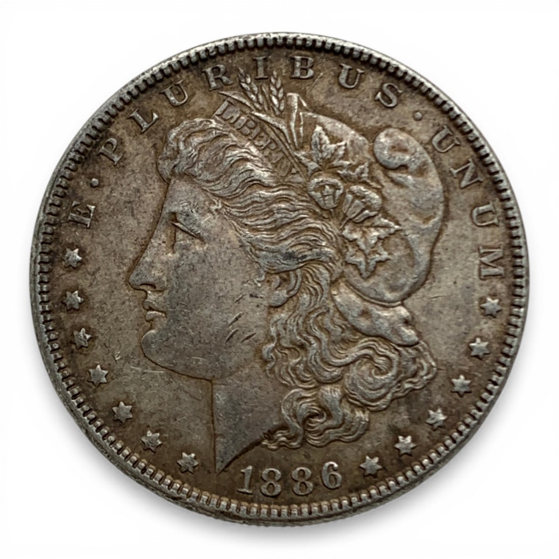 1886 Morgan Silver Dollar: 90% Silver Content - United States Of America~ One Dollar