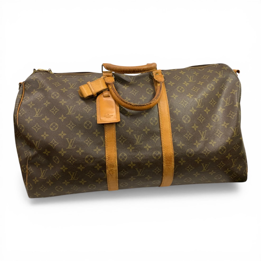 Vintage Louis Vuitton Keepall V Duffle Bag: Vintage Louis Vuitton Keepall 50 Duffle Bag Crafted In Signature Brown Monogram Canvas. 23" In LengthBag Shoes Wear Normal To Usage, One Sde Of The Strap Is Broken, Original Ring Is Included
