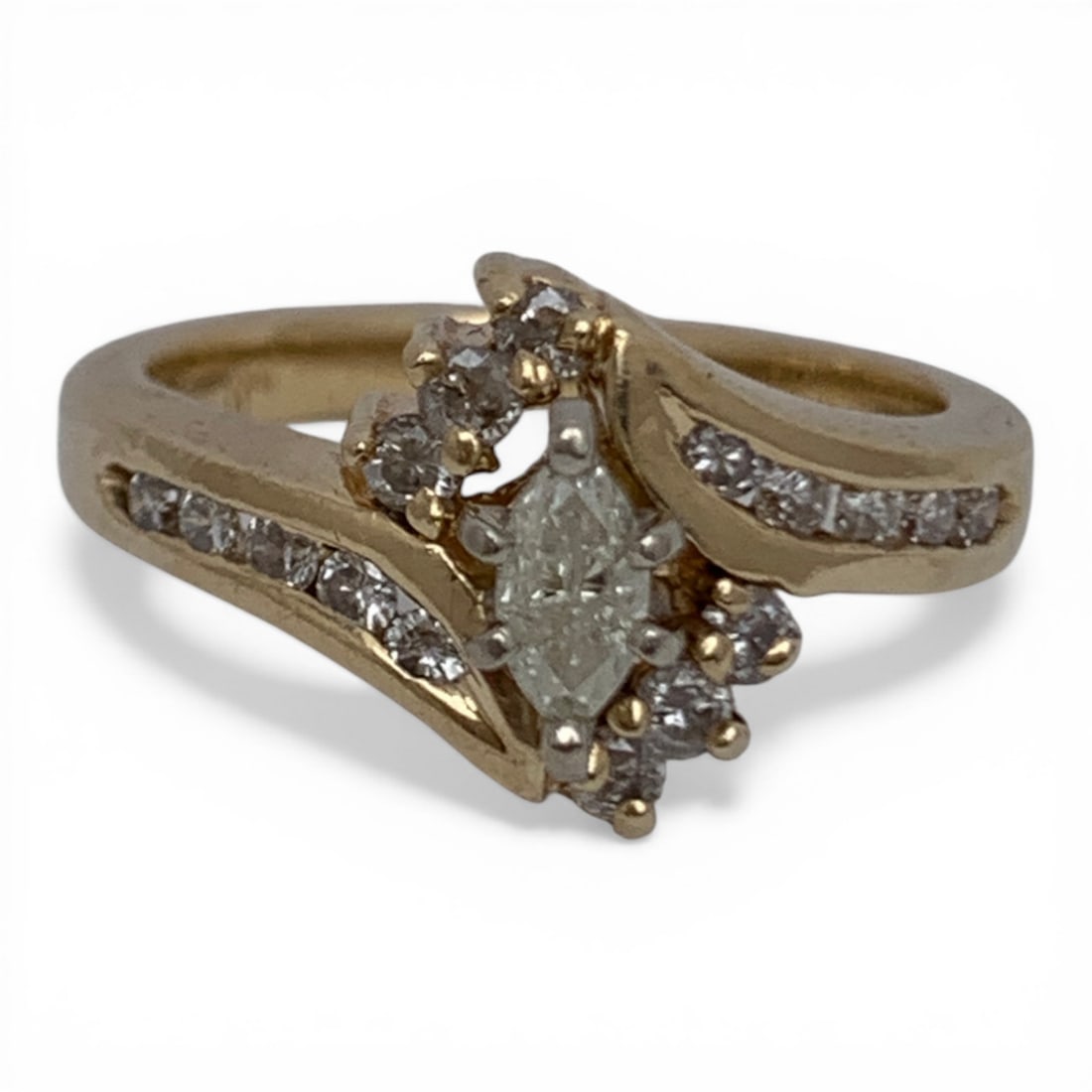 Vintage 14k Gold & Diamond Bypass Engagement Ring: Vintage 14k Yellow Gold & Diamond Engagement Ring Featuring A Bypass Design & 1 Approx. 0.25ct Marquise Cut Center Diamond Flanked By 6 Round Cut Diamonds Approx 0.03 Each & 10 Round Cut Channel Set D