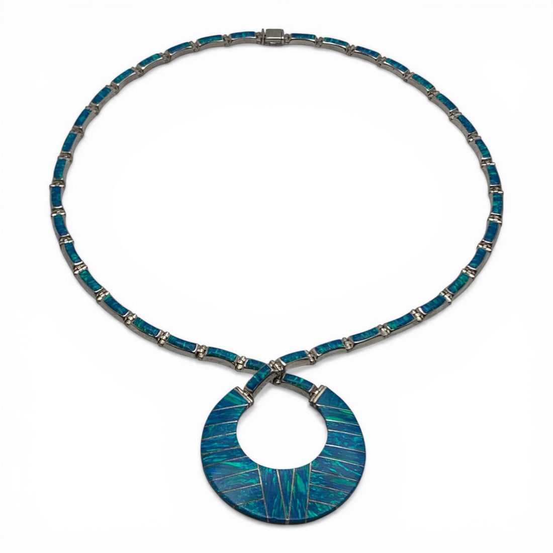 T. Juarez Sterling Silver & Blue Opal Necklace: T. Juarez Sterling Silver Pendant Necklace With A Criss Cross Design Featuring Blue Opal Stones Marked: T. Juarez Mex 925 - 5 5/8" Inside Width, 8 3/8" Long - 29.1 Grams