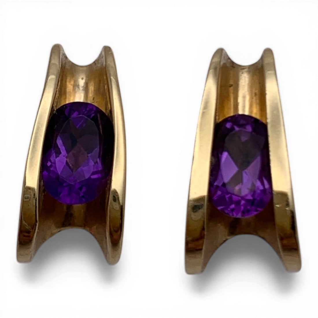 Pair Of 14k Yellow Gold Purple Amethyst Earrings: Pair Of 14k Yellow Gold Earrings With A Folded Design Featuring An Oval Cut Purple Amethyst GemstoneMarked 14k - 5/8" Long - 2.8 DwtGemstones Tested With Presidium Gem Tester Il - Berners Does Not