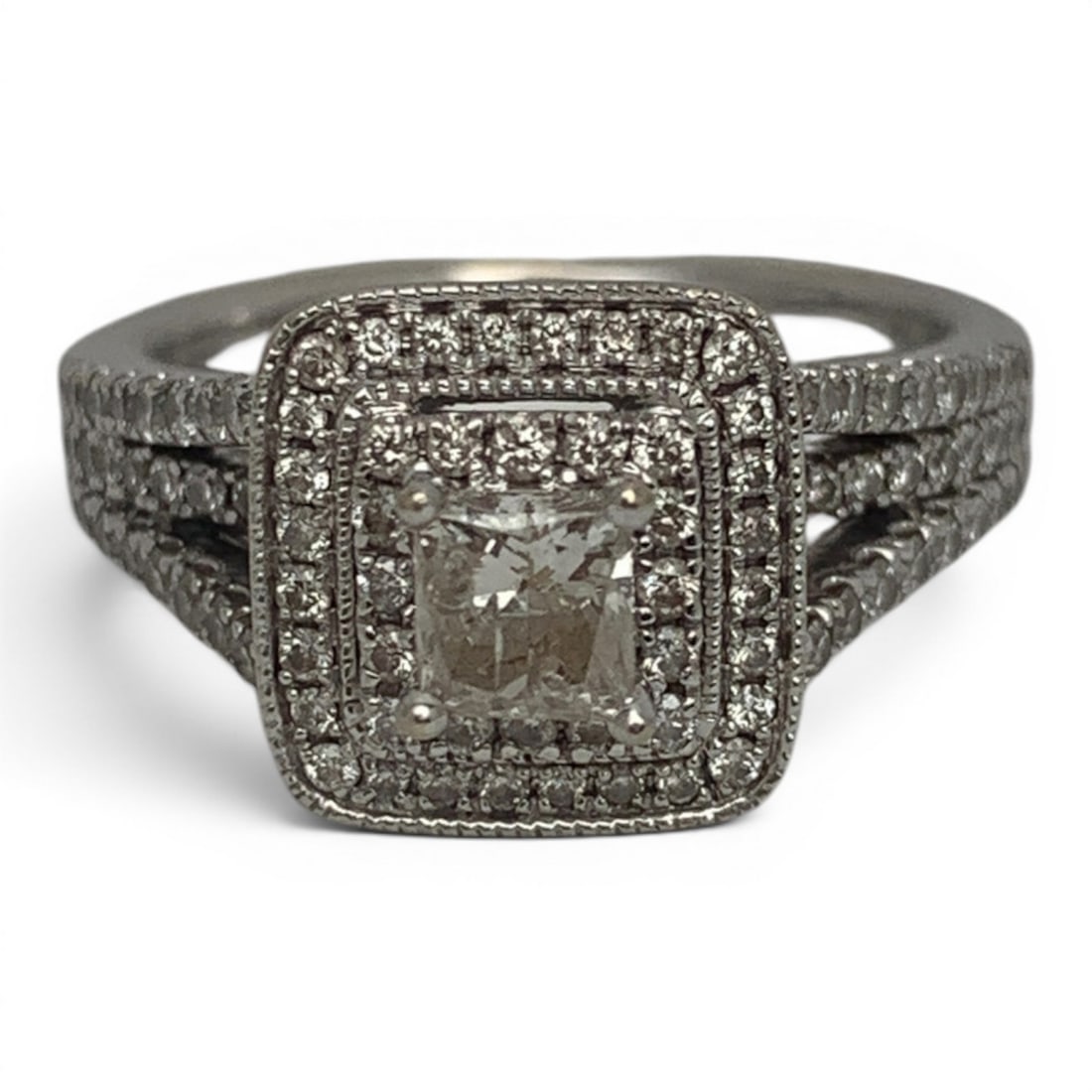 14k White Gold & Diamond Engagement Ring: 14k White Gold Ring Featuring 1 Prominent Princess Cut Diamonds Approx. 0.45ct Surrounded By A Double Halo Of 44 Round Cut Diamonds Approx. 0.01ct Each. Set Along The Band Are 26 Round Cut Diamonds In