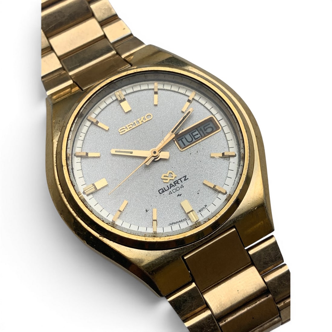 Vintage Seiko Gold Tone Wrist Watch: Marked On Face: Seiko, Quartz, JapanMarked On Back: Base Metal Top, St. Steel Back, 4633-8079Marked On Band: Seiko37.45mm Face Diameter