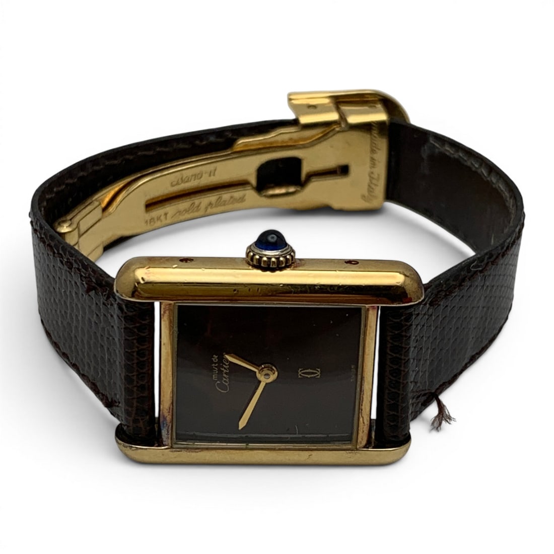 Must De Cartier Silver & Gold Plated Tank Watch: Marked On Face: Must De Cartier, SwissMarked On Back: Cartier Paris, 925, Argent, Swiss, 3040096Marked On Clasp: Made In Italy, 18kt Gold PlatedMarked On Band: Genuine Lizard On Calfskin, Made In