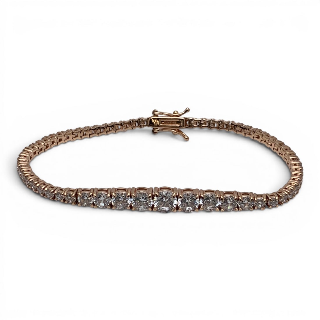 Sterling Silver & Cubic Zirconia Bracelet: Sterling Silver Bracelet Featuring A Rose Gold Tone & Cubic Zirconia StonesMarked: 925 Cz - 7 7/8" Long - 13.1 Grams