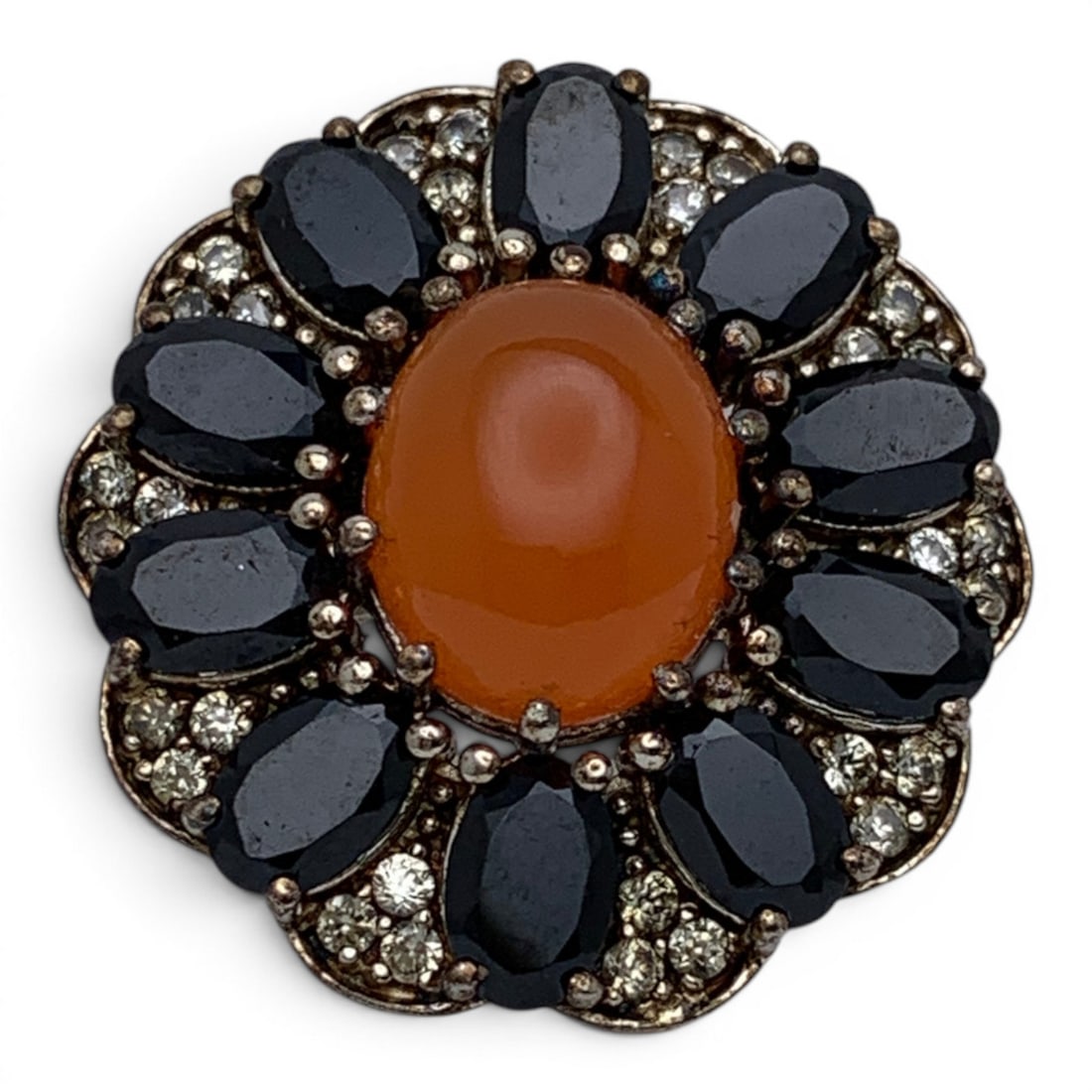 Vintage Sterling Silver Cocktail Ring: Vintage Sterling Silver Cocktail Ring Featuring A Center Set Cabochon Orange Stone Surrounded By Black Stones Marked 925 - Size 10 - 8.5 Grams