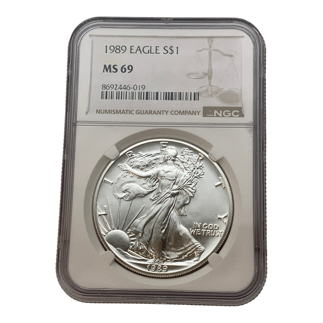 Ngc 1989 $1 American 1oz. Fine Silver Eagle: In Ngc Graded Case - Ms 69Marked On Obverse: LibertyMarked On Reverse: United States Of America, One Dollar, 1oz. Fine Silver