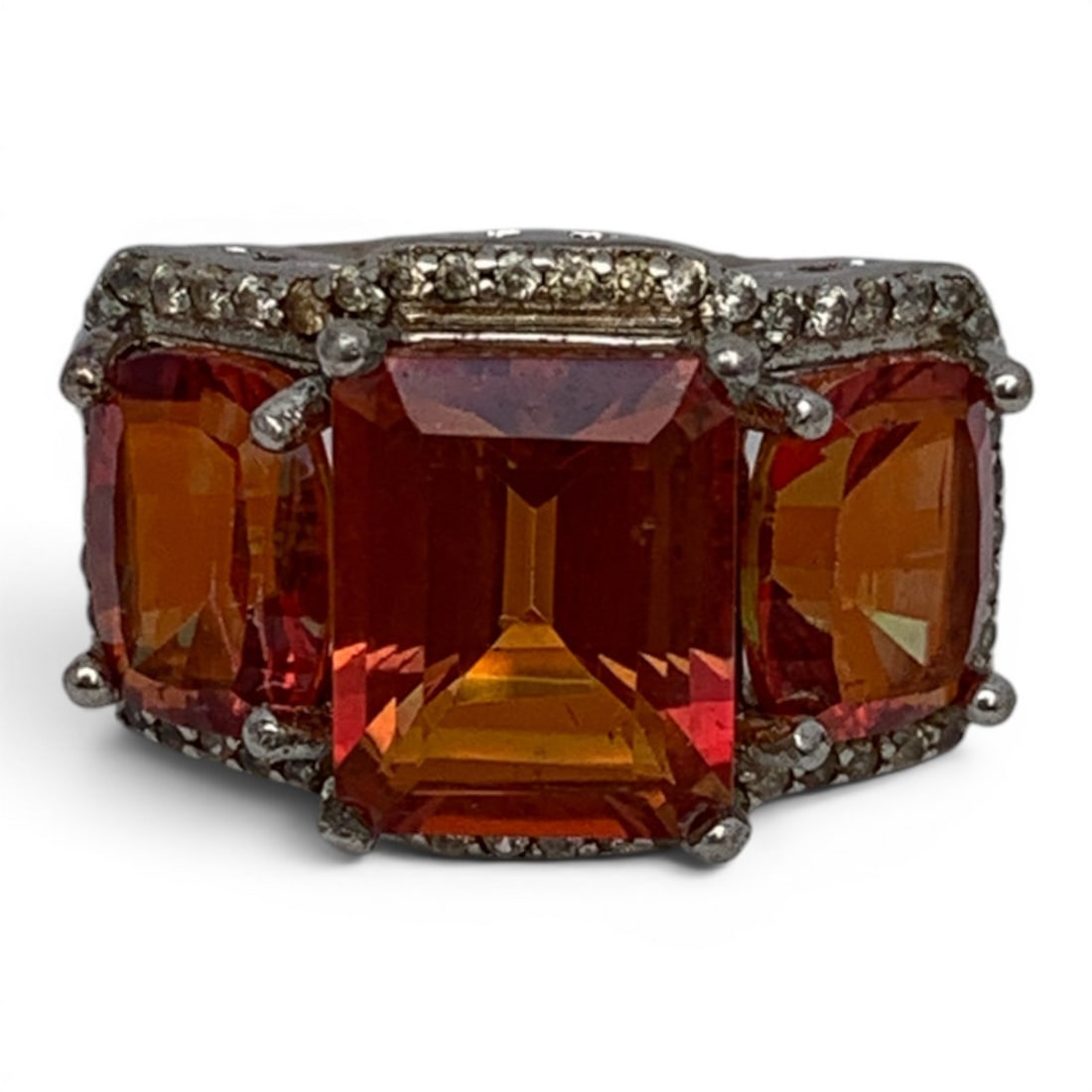 Sterling Silver Clear Stone & Orange Stone Ring: Sterling Silver Ring Featuring Clear Stones & 3 Center Set Orange/ Red Stones.Marked: 925 - Size 8 - 5.3 Grams