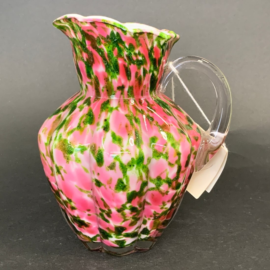 Vintage Fenton Art Glass Pitcher: Vintage Fenton Art Glass Pitcher In The "vasa Murrhina" Pattern Featuring Rose Pink And Adventurine Green Colors With A Ruffled RimBears Tag: Vasa Murrhina Fenton Art Glass5 1/2" Tall