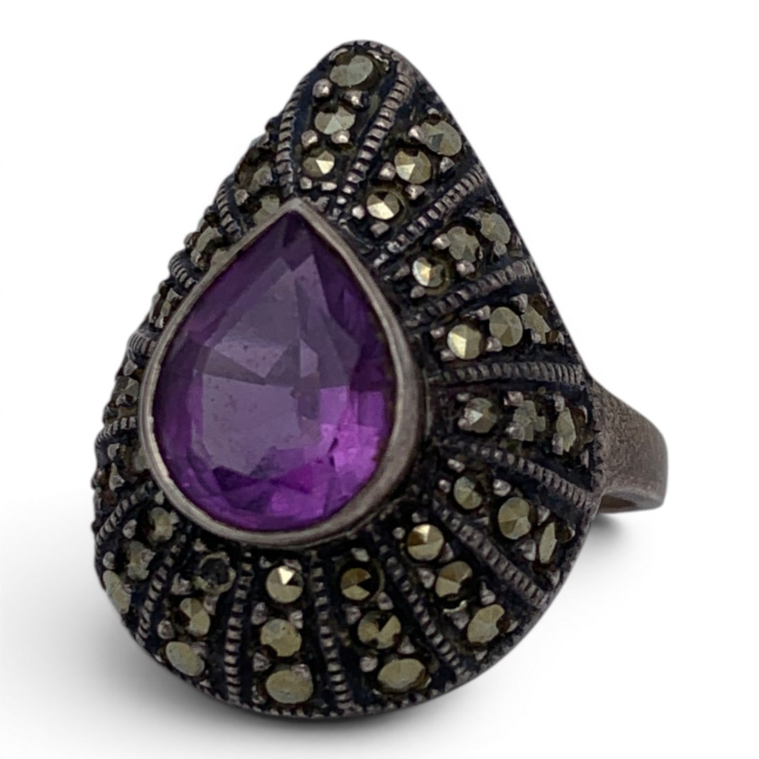 Sterling Silver Marcasite & Purple Stone Ring: Sterling Silver Teardrop Ring Featuring A Purple Marquise Cut Stone Surrounded By Marcasite Marked Sterling - Size 9 - 6.7 Grams