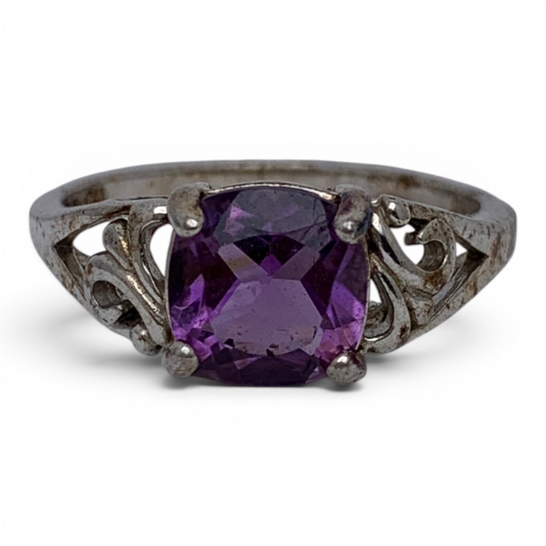 Sterling Silver & Purple Stone Ring: Sterling Silver Ring Featuring An Open Work Design & A Cushion Cut Purple Stone Marked: 925 - Size 9 - 3.2 Grams