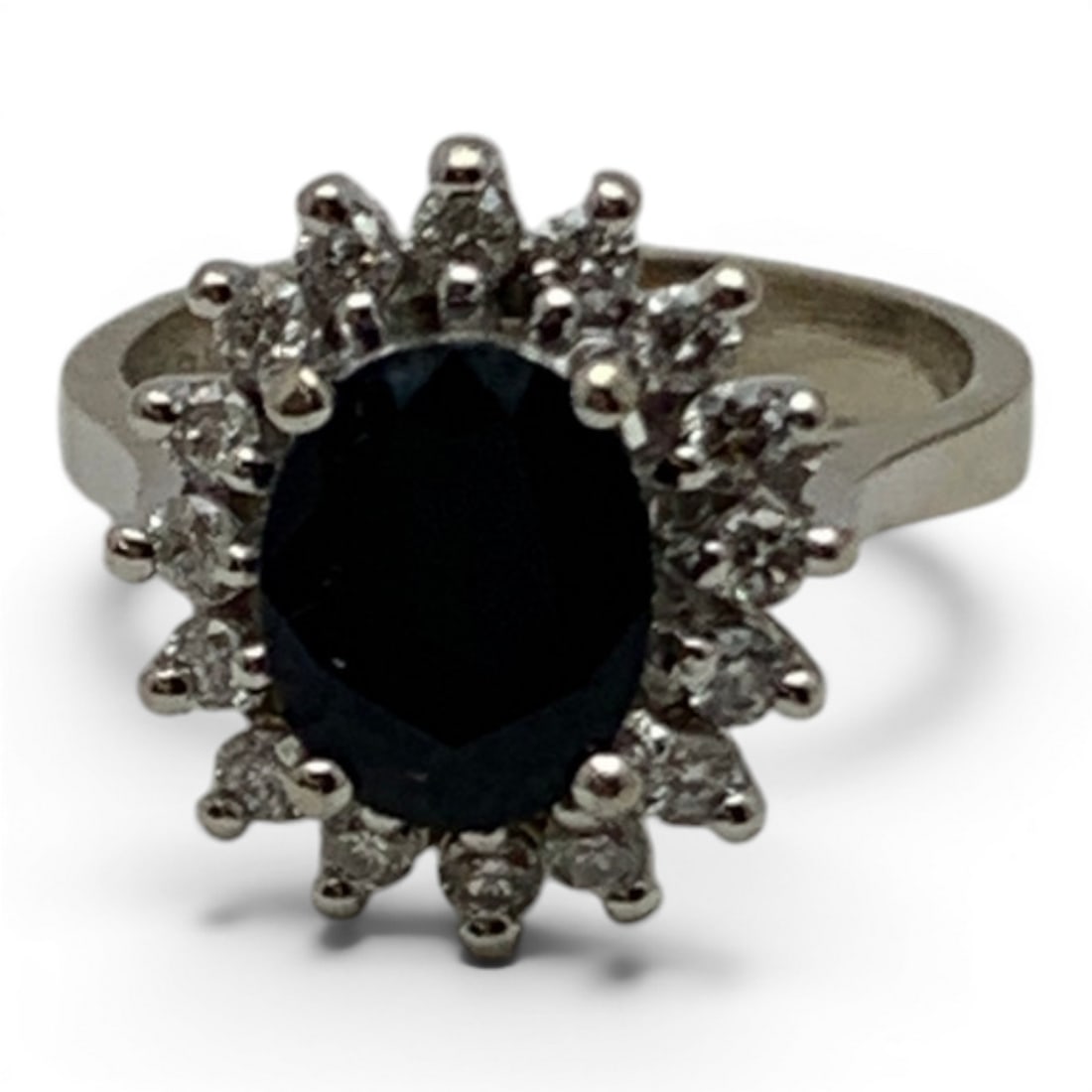 14k White Gold Diamond & Sapphire Ring: 14k White Gold Ring Featuring A Prominent Oval Cut Blue Sapphire Surrounded By 16 Round Cut Lab Grown Diamonds Approx. 0.03ct EachMarked 14k - Size 6 - 2.9 DwtGemstones Tested With Presidium Gem