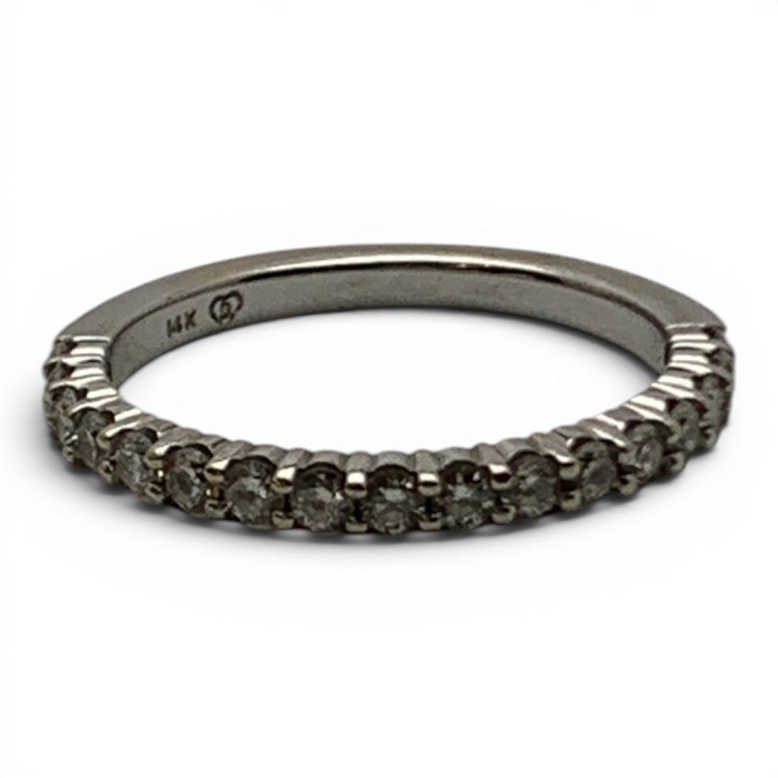 14k White Gold & Diamond Band: 14k White Gold Band Featuring 17 Round Cut Earth Mined Diamonds Approx. 0.05ct Each.Marked 14k - Size 6.75 - 1.4 DwtGemstones Tested With Presidium Gem Tester Il - Berners Does Not Guarantee