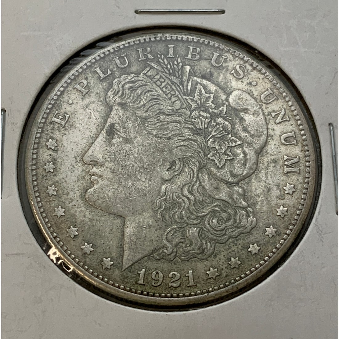 1921 Morgan Silver Dollar: 90% Silver ContentMarked On Reverse: United States Of America, One Dollar