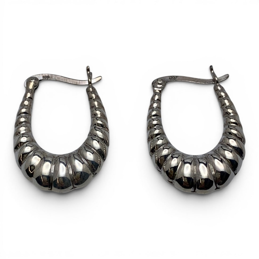 Pair Of Sterling Silver Textured Earrings: Pair Of Sterling Silver Earrings Featuring A Textured DesignMarked: 925 - 1" Long - 3.8 Grams