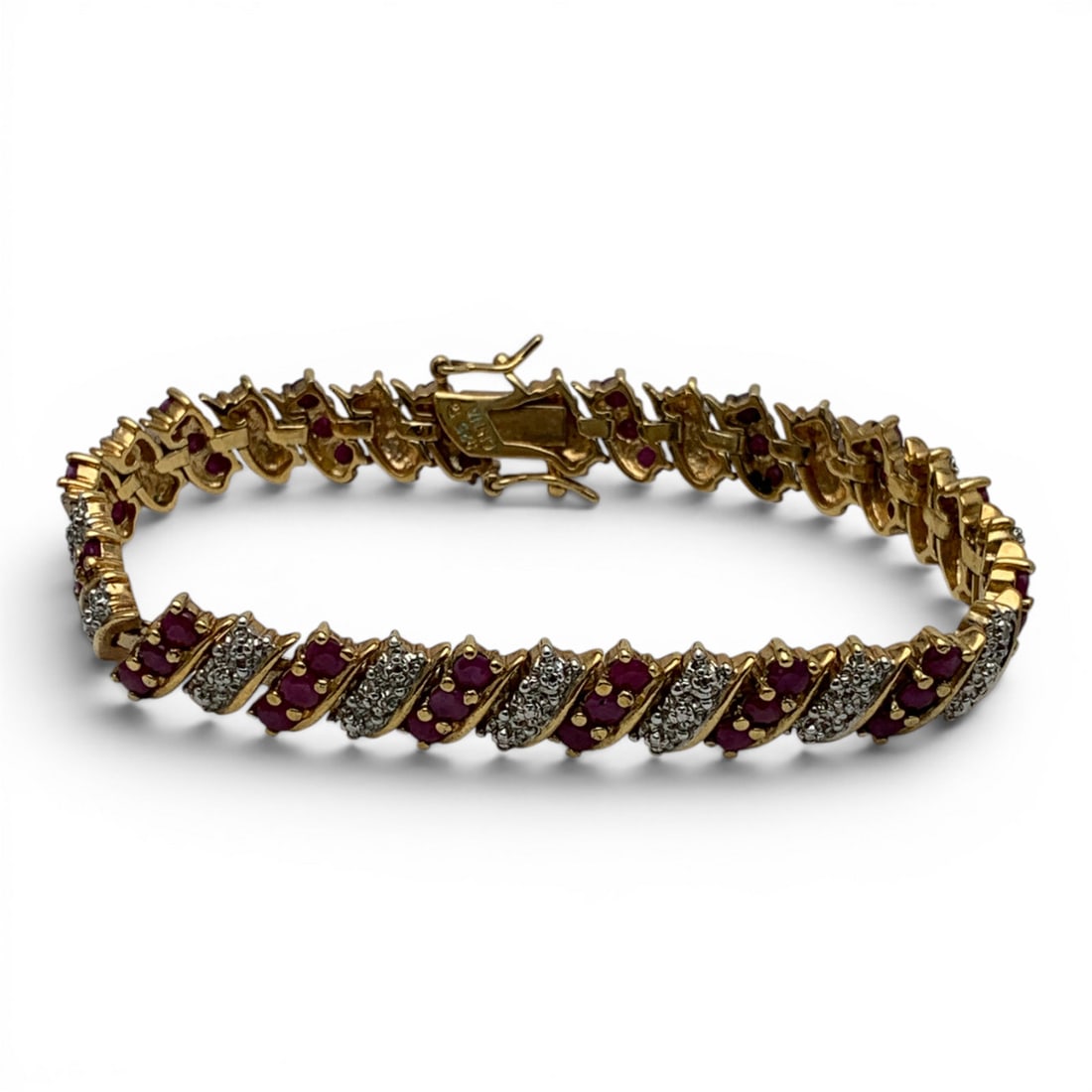 Sterling Silver Gold Tone Bracelet With Rubies: Vintage Sterling Silver Bracelet Featuring Round Cut Ruby GemstonesMarked: 925 - 7 3/4" Long - 25.4 Grams