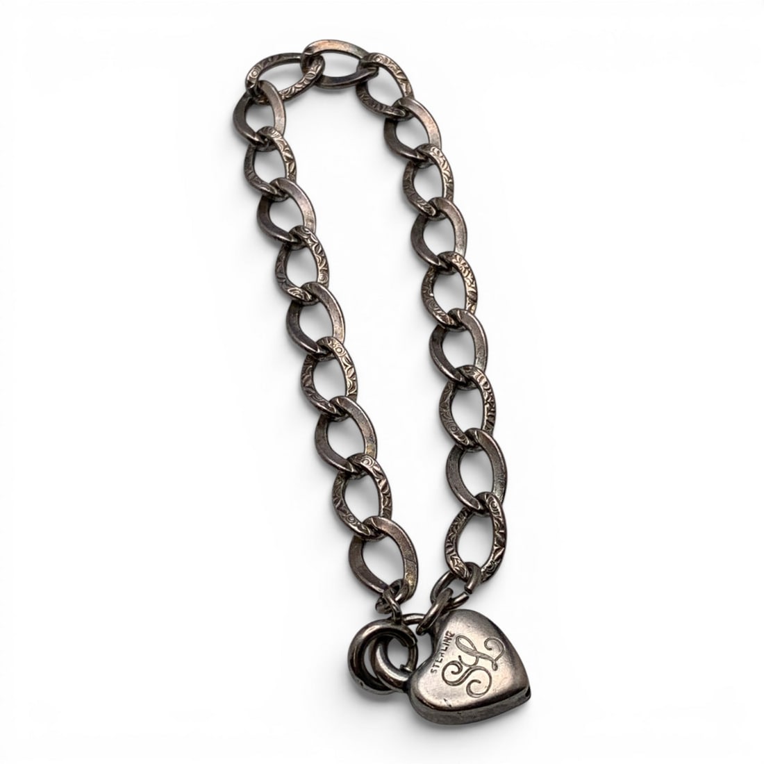 Sterling Silver Heart Lock Bracelet: Sterling Silver Bracelet Featuring A Heart Lock Clasp Marked: Sterling - 7 1/2" Long - 11.2 Grams