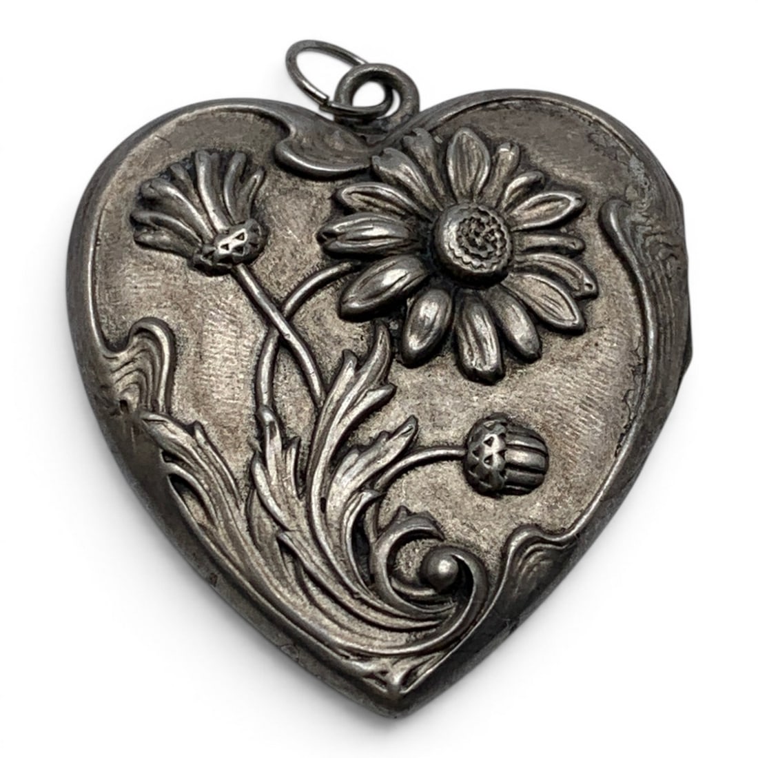 Sterling Silver Heart Locket Pendant: Sterling Silver Heart Pendant Locket Featuring A Raised Floral Motif Marked: Sterling - 1 1/2" Long - 8.5 Grams
