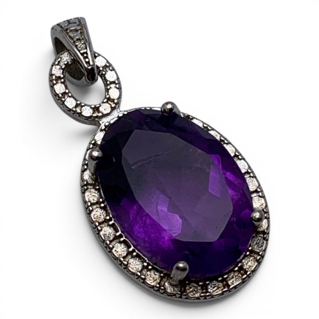 Sterling Silver & Purple Stone Pendant: Sterling Silver Pendant Featuring 1 Oval Cut Purple Stone Marked: 925 - 1" Long - 2.9 Grams