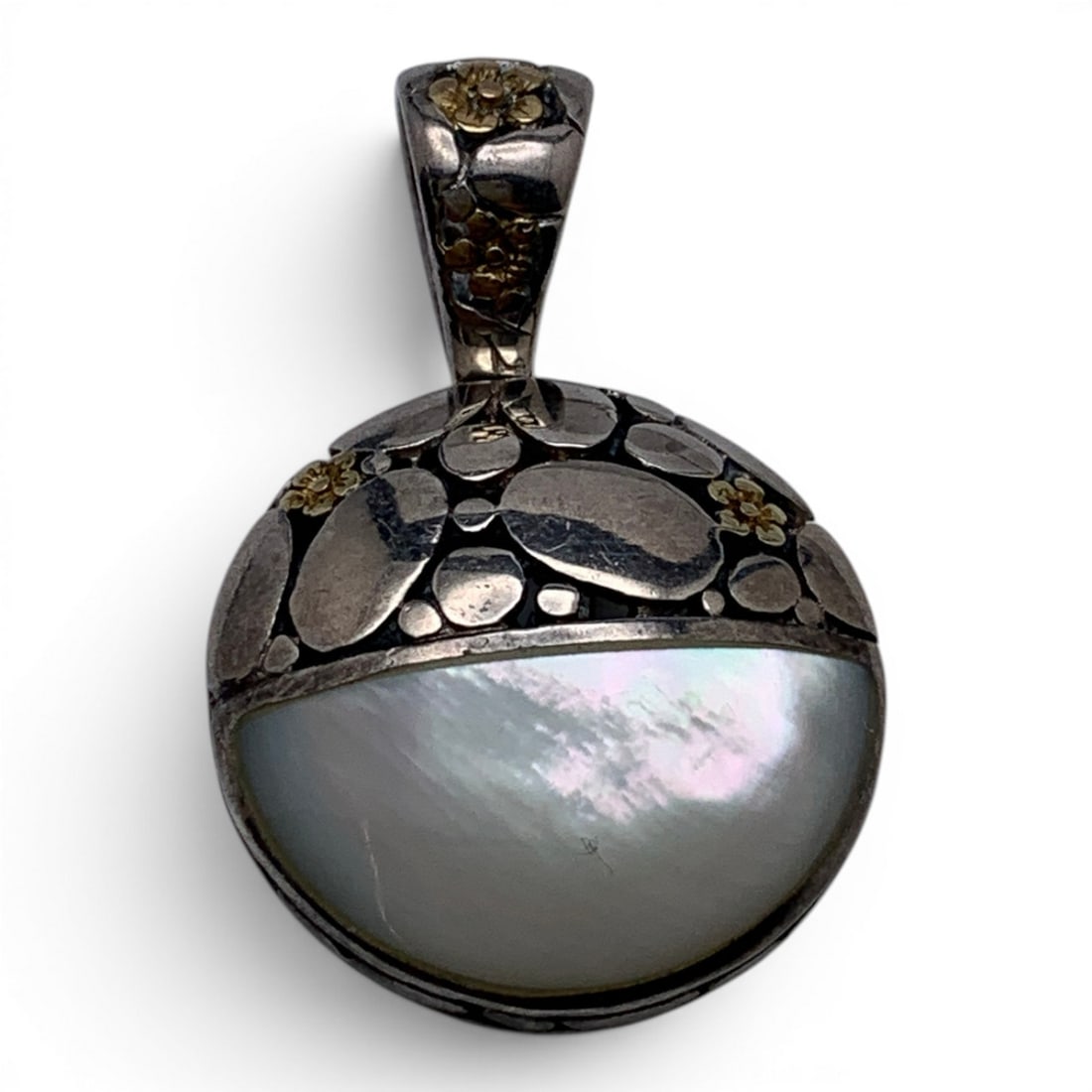 Sterling Silver & Mother Of Pearl Pendant: Sterling Silver Pendant Featuring An Open Work Design & A Mother Of Pearl StoneMarked: 925 - 1 3/8" Long - 7.7 Grams