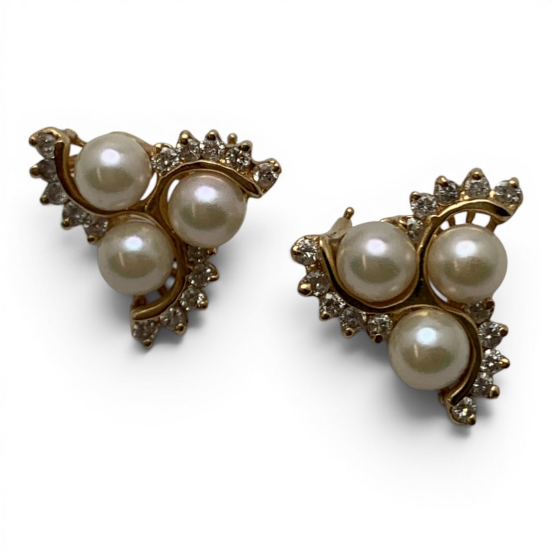 14k Yellow Gold Diamond & Pearl Clip Earrings: Pair Of 14k Yellow Gold Earrings Featuring 3 White Pearls Set In A Cluster Surrounded By 3 Rows Of 5 Round Cut Earth Mined Diamonds Each Approx. 0.05ctMarked 14k - 3/4" Long - 6.1 DwtGemstones Tested 