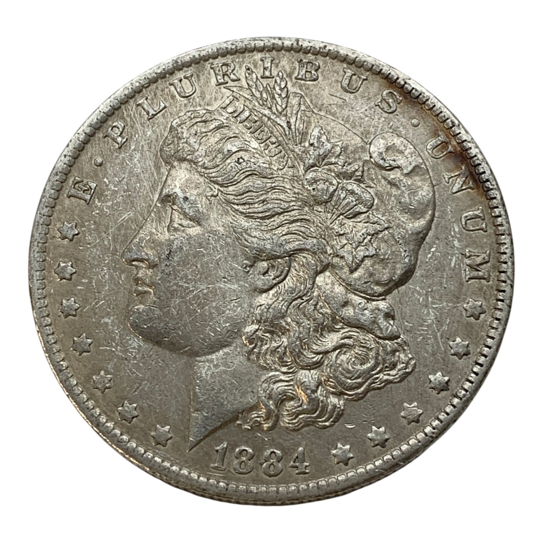 1884 O Morgan Silver Dollar: 90% Silver ContentMarked On Reverse: United States Of America. One Dollar