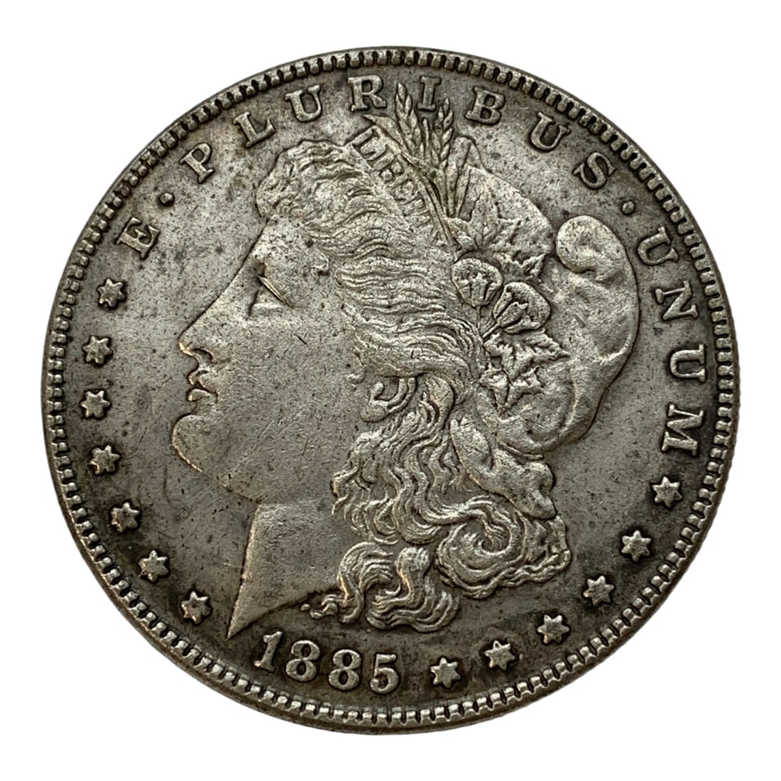 1885 Carson City Morgan Silver Dollar: 90% Silver ContentMarked On Reverse: United States Of America. One Dollar