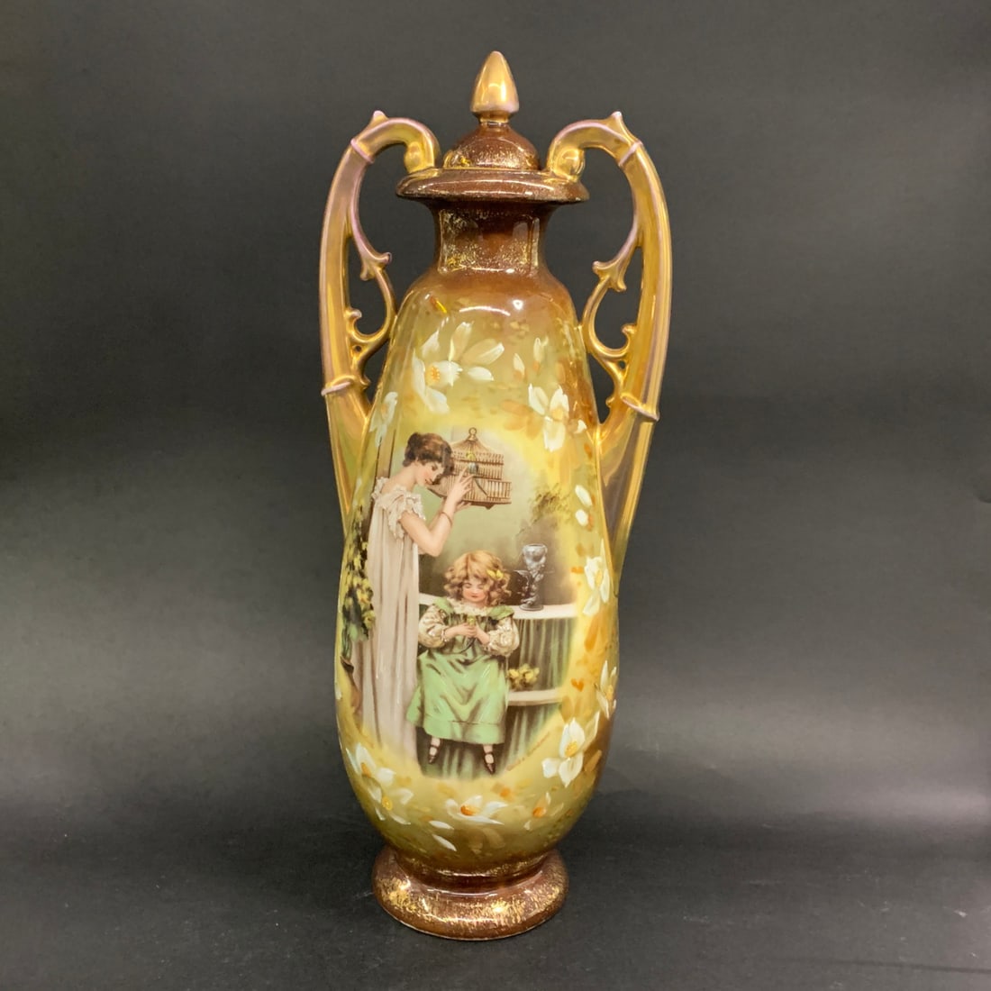 Maude Goodman Victoria Austria Vase: Maude Goodman Victoria Austrian Vase Featuring Two Women Playing With Birds.Signed On Portrait In Lower Right: Maude GoodmanMarked On Bottom: Victoria, Austria15 1/2" Tall