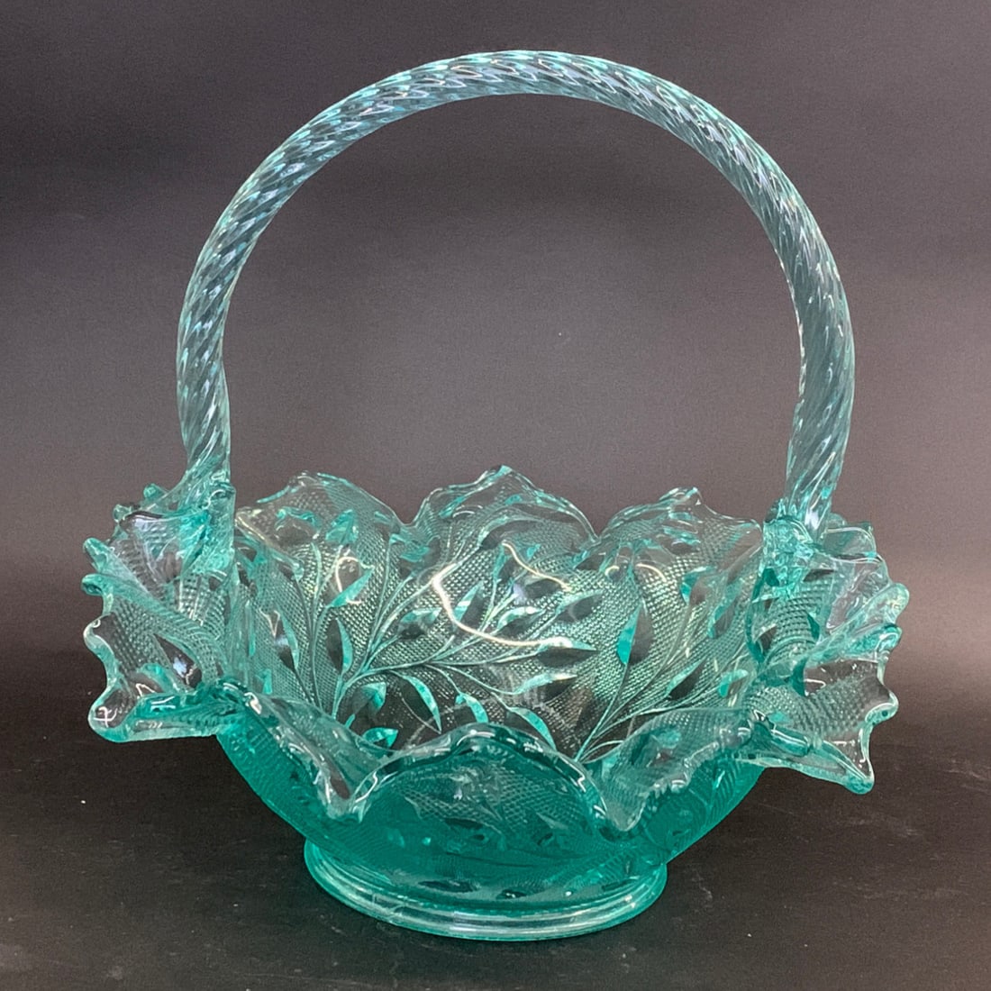 Vintage Fenton Turquoise Art Glass Basket: Vintage Fenton Art Glass Basket In A Turquoise Blue Opalescent Color With A Twisted HandleMarked On Bottom10 1/4" Tall
