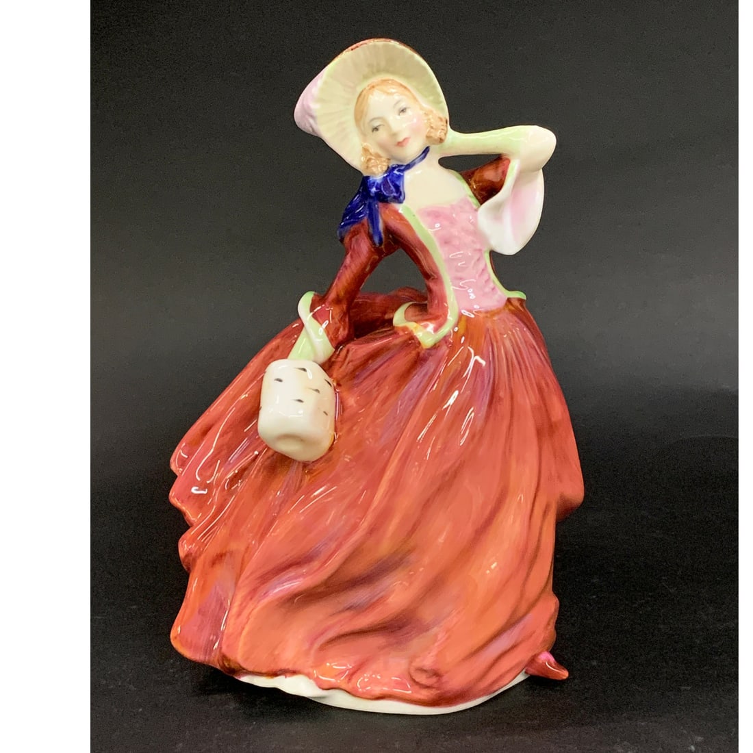 Royal Doulton Bone China Figurine, Autumn Breezes: Royal Doulton Bone China Figurine, Autumn Breezes Marked On Bottom: Royal Doulton, Hand Made And Hand Decorated, Made In England, Bone China, Royal Doulton Tableware Limited 1939, Hn 19348" Tall