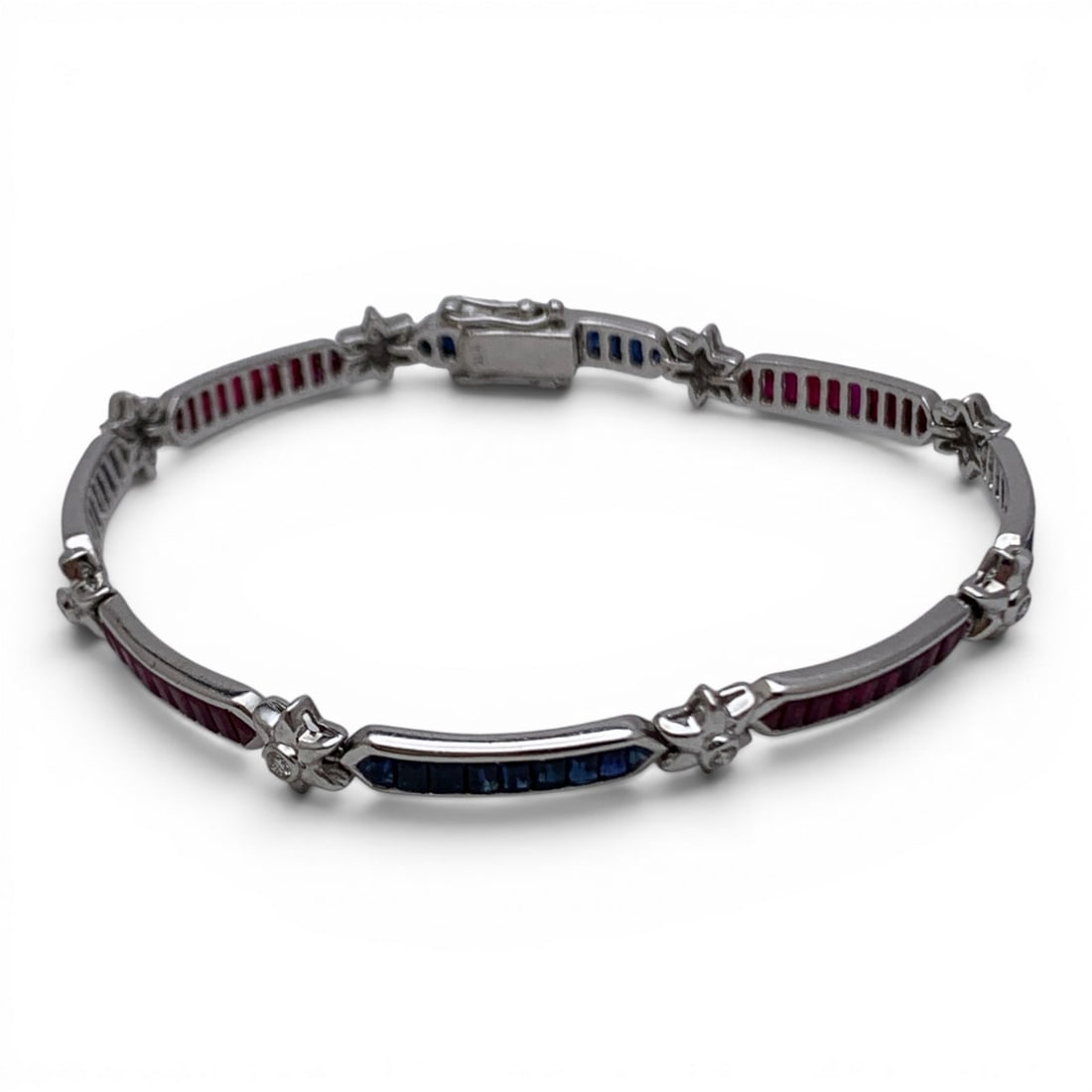 18k White Gold Diamond Sapphire & Ruby Bracelet: 18k White Gold Bracelet Featuring 8 Round Cut Diamonds Approx. 0.03ct Each Accompanied By Rows Of Alternating Blue Sapphire & Pink Ruby Gemstones Channel Set In The Bracelet Marked: 18k - 7 3/8" Long 