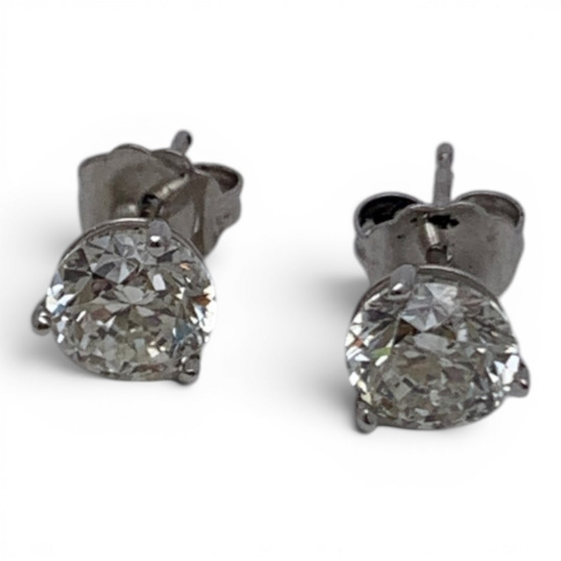 Pair Of 14k White Gold & Diamond Earrings: Pair Of 14k White Gold Earrings Featuring A Round Cut Diamond Approx. 0.85ct Each.Marked: 14k - 1/4" Long Diameter - 0.7 DwtGemstones Tested With Presidium Gem Tester Il - Berners Does Not Guarantee