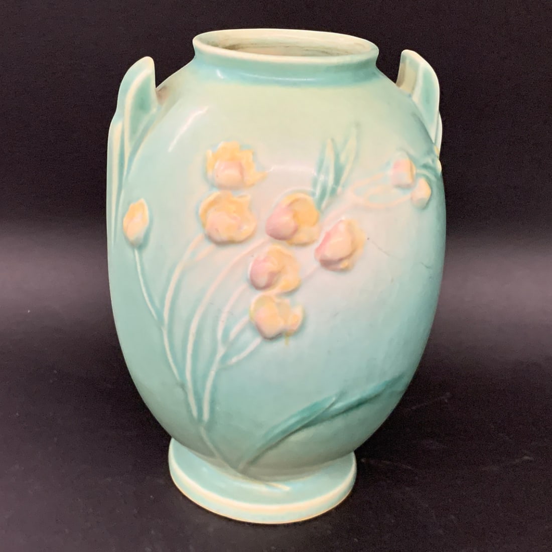 Roseville Pottery Ixia Vase: Roseville Pottery Vase In The Ixia Pattern Featuring A Green Glaze And Yellow Floral DetailsMarked On Bottom: Roseville7 1/2" Tall