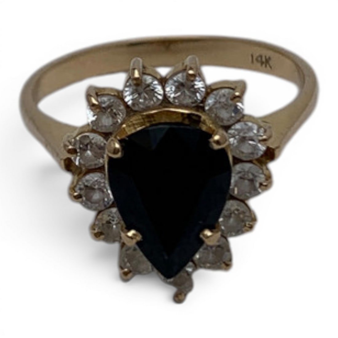 14k Yellow Gold Diamond & Sapphire Ring: 14k Yellow Gold Ring Featuring 1 Prominent Teardrop Cut Blue Sapphire Gemstone Surrounded By 13 Round Cut Diamonds Approx. 0.05ct EachMarked: 14k - Size 6 - 2.1 DwtGemstones Tested With Presidium Gem