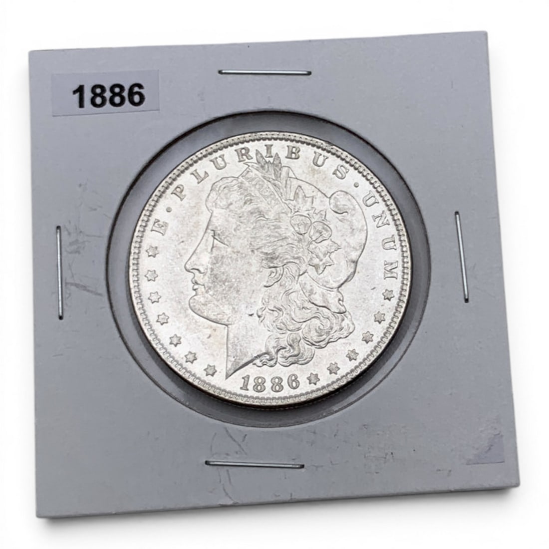 1886 Morgan Silver Dollar: 90% Silver Content - United States Of America, One Dollar