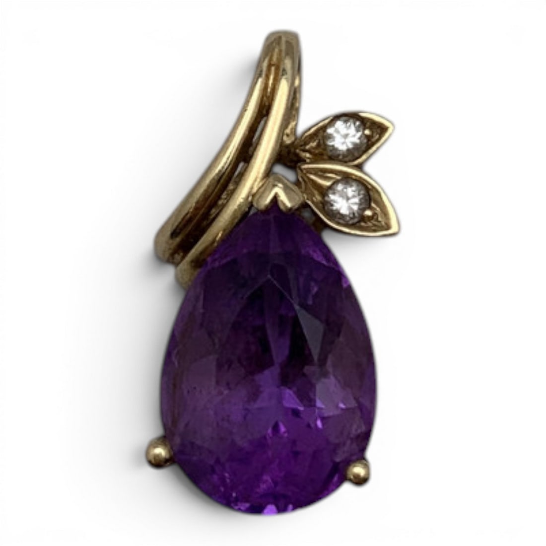 14k Yellow Gold Diamond & Amethyst Pendant: 14k Yellow Gold Pendant Featuring 1 Large Teardrop Cut Purple Amethyst Gemstone With 2 Round Cut Diamonds Approx. 0.05ct Each Marked: 14k - 7/8" Long - 1.9dwtGemstones Tested With Presidium Gem