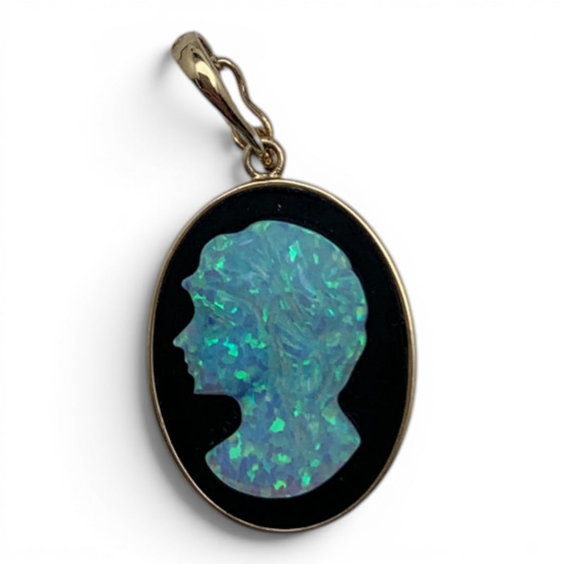 14k Yellow Gold Black Onyx & Opal Cameo Pendant: 14k Yellow Gold Pendant Featuring A Black Onyx Stone With A Carved Blue Opal Cameo Set On The Black Onyx StoneMarked: 14k - 1 1/4" Long - 1.6 DwtGemstones Tested With Presidium Gem Tester Il -