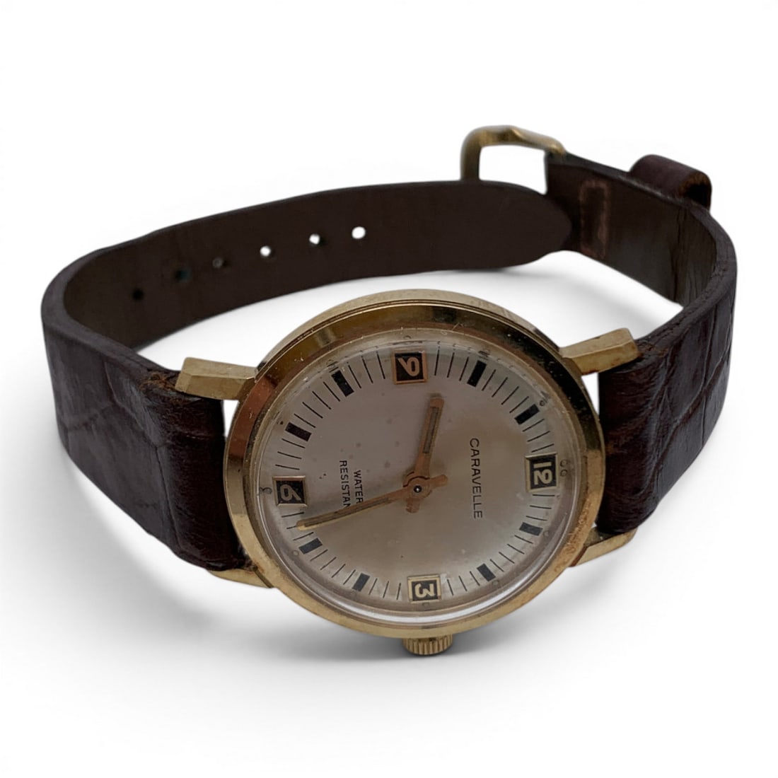 Vintage Men's Caravelle Wrist Watch: Vintage Men's Caravelle Wrist Watch Marked On Face: CaravelleMarked On Back: Caravelle, Base Metal Bezel, Stainless Steel BackMarked On Band: Caravelle9 1/8" Long - 1 1/8" Face Diameter