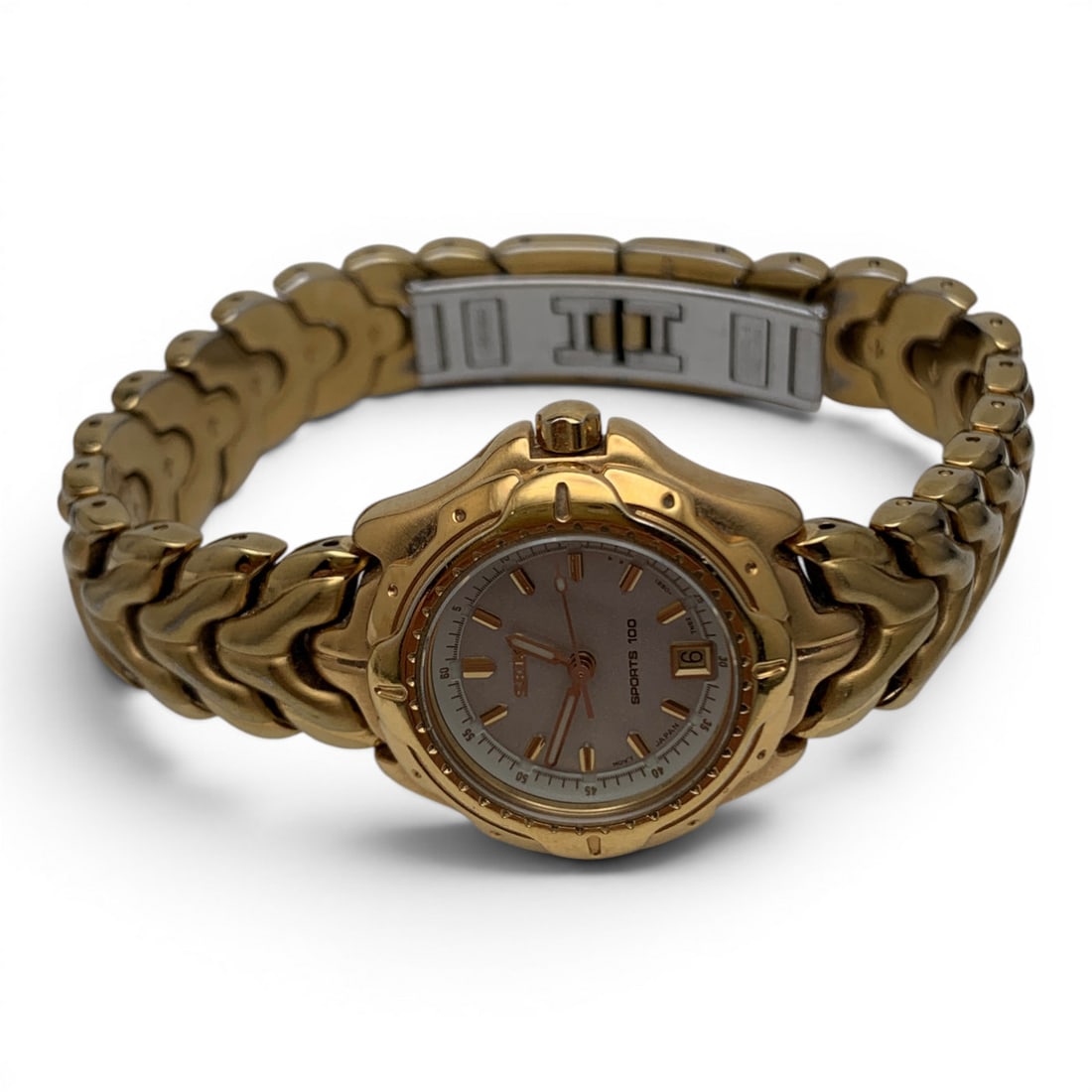 Women's Seiko Sports 300 Gold Tone Wrist Watch: Women's Seiko Sports 300 Gold Tone Wrist Watch Marked On Face: Seiko, Sports 300Marked On Back: Seiko, Sapphlex Crystal, St. Steel & Base Metal, 551699Marked On Band: Seiko1 1/8" Face Diameter