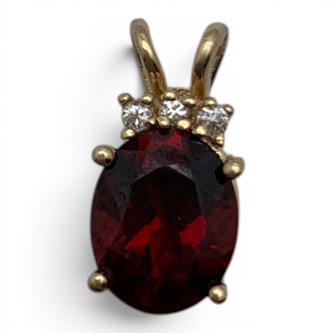 14k Yellow Gold Diamond & Red Garnet Pendant: 14k Yellow Gold Pendant Featuring A Prominent Oval Cut Red Garnet Gemstone & 3 Round Cut Diamonds Approx. 0.03ct EachMarked: 14k - 5/8" Long - 1.3 DwtGemstones Tested With Presidium Gem Tester Il -