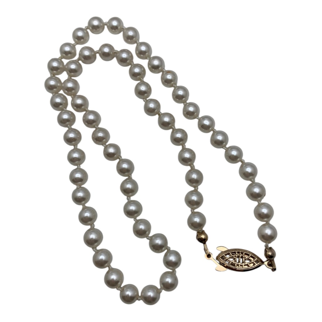 Faux White Pearl Necklace: Costume Necklace Featuring Faux White Pearls And A Gold Tone Clasp 17 1/2" Long