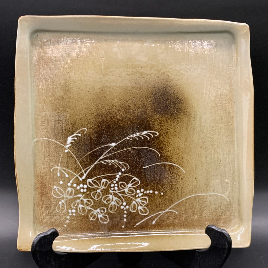 Ceramic Cream Colored Square Tray: Creamic Cream Colored Square Tray Featuring A Brown Stained Center And A White Floral MotifBears Mark On Back11" X 11 1/2"