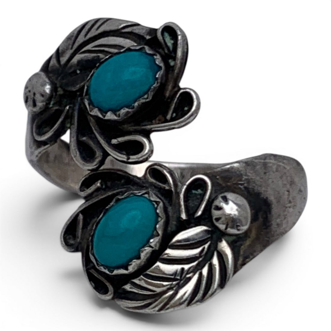 Navajo Sterling Silver & Turquoise Ring: Navajo Sterling Silver Ring With A Feather Design Featuring 2 Cabochon Turquoise StonesMarked Sterling - Size 7.5 - 5.5 Grams